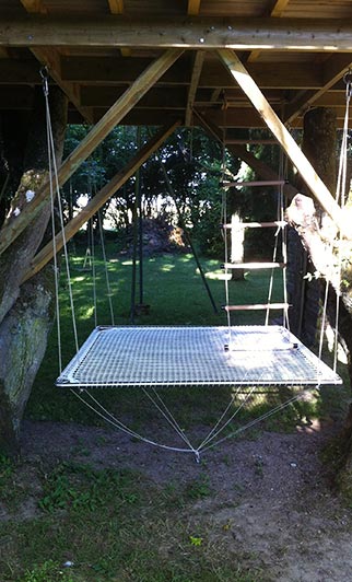 suspended platform in the garden with a catamaran net