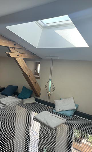 white loft net suspended in home